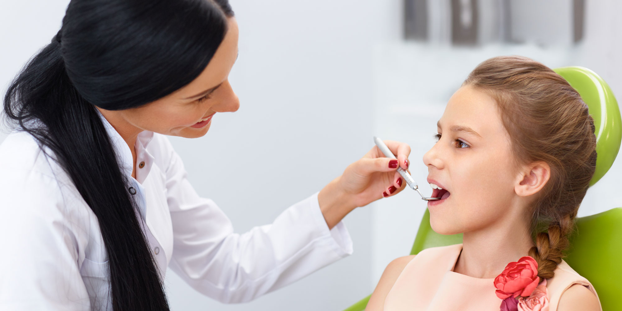 pediatric dental patient getting checkup
